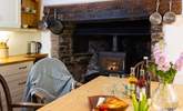 The kitchen/diner boasts a toasty wood-burner. - Thumbnail Image