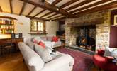 The sitting-room offers country charm with modern comforts. - Thumbnail Image