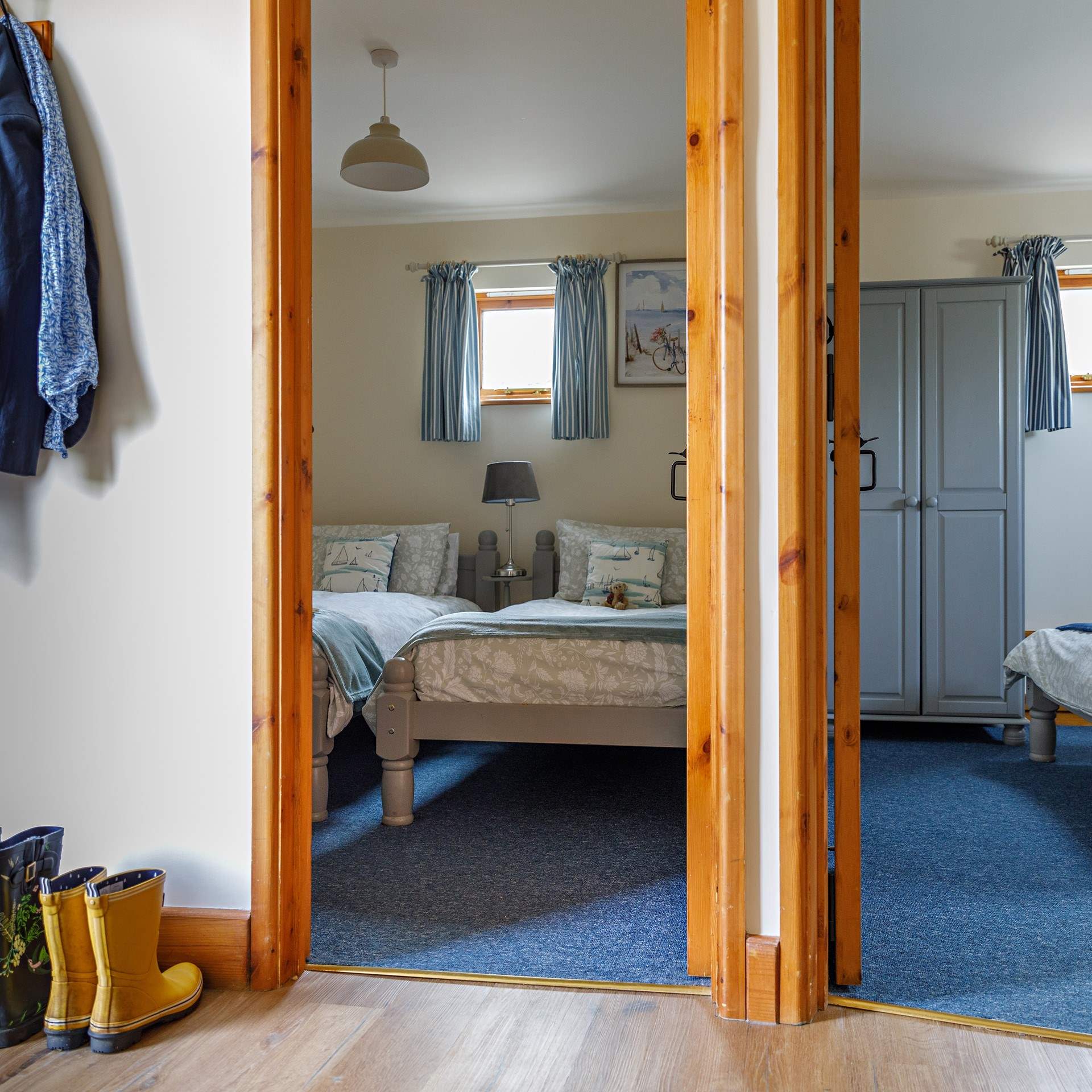 Twin or another double with a spacious hallway.