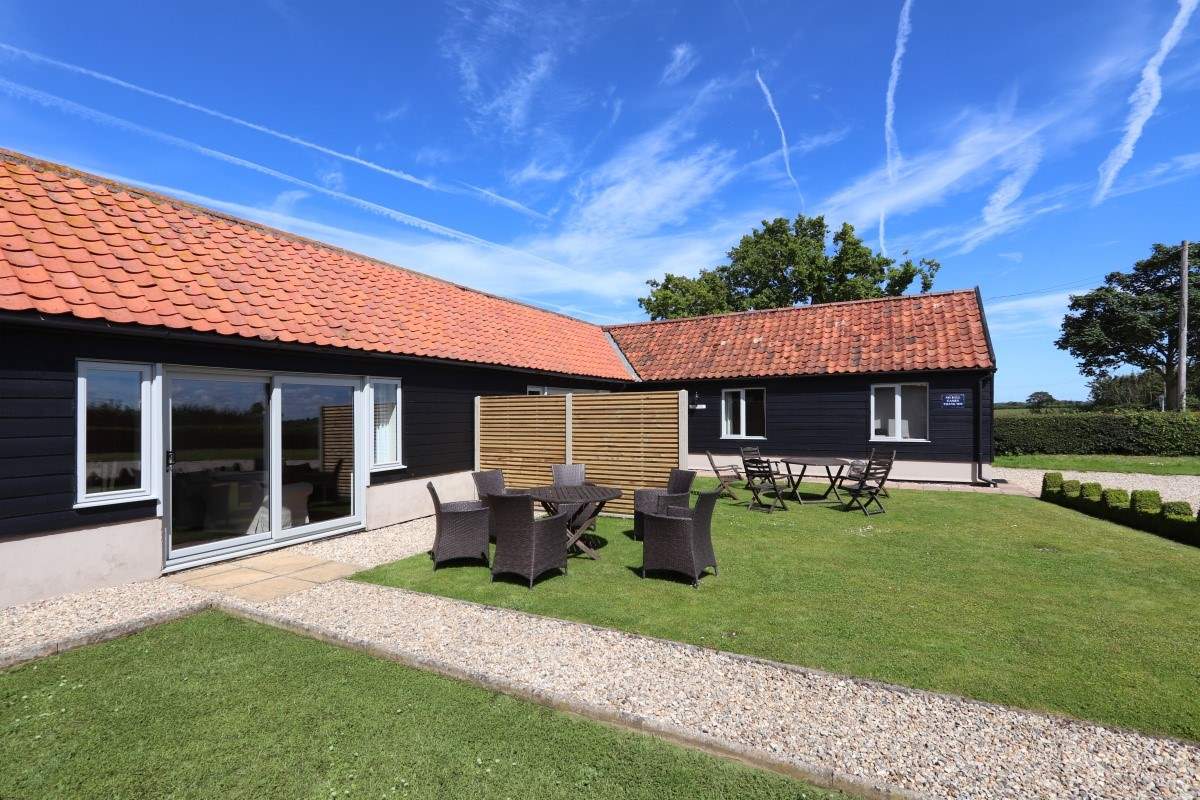 Sunnyside - where the light floods in through the patio doors under Norfolk's Big Skies.