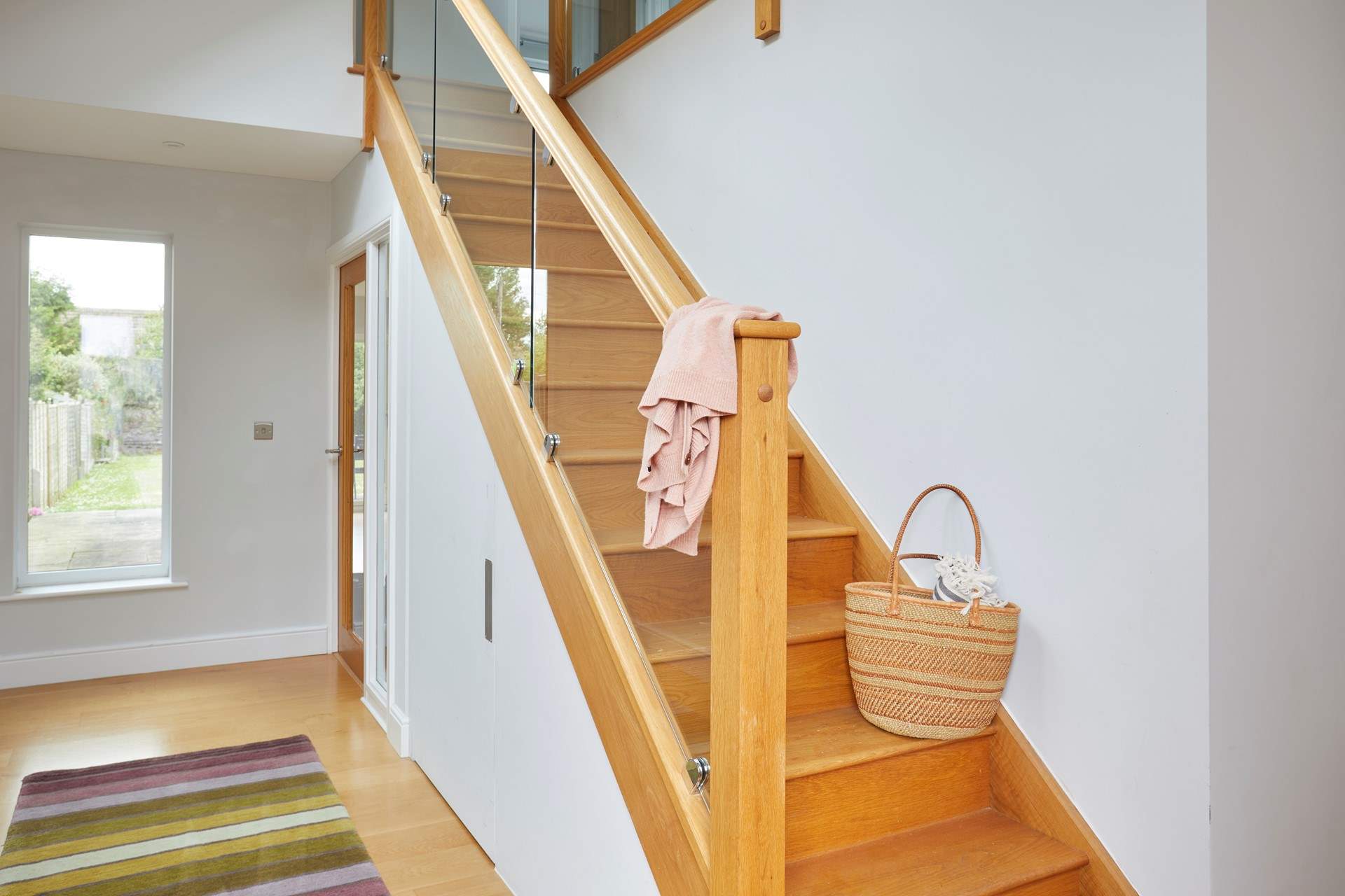 The bright hallway echoes the modern feeling that runs throughout.