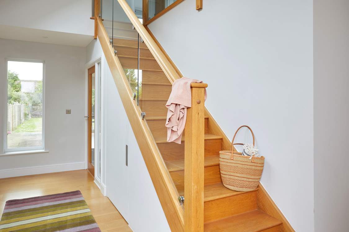 The bright hallway echoes the modern feeling that runs throughout.