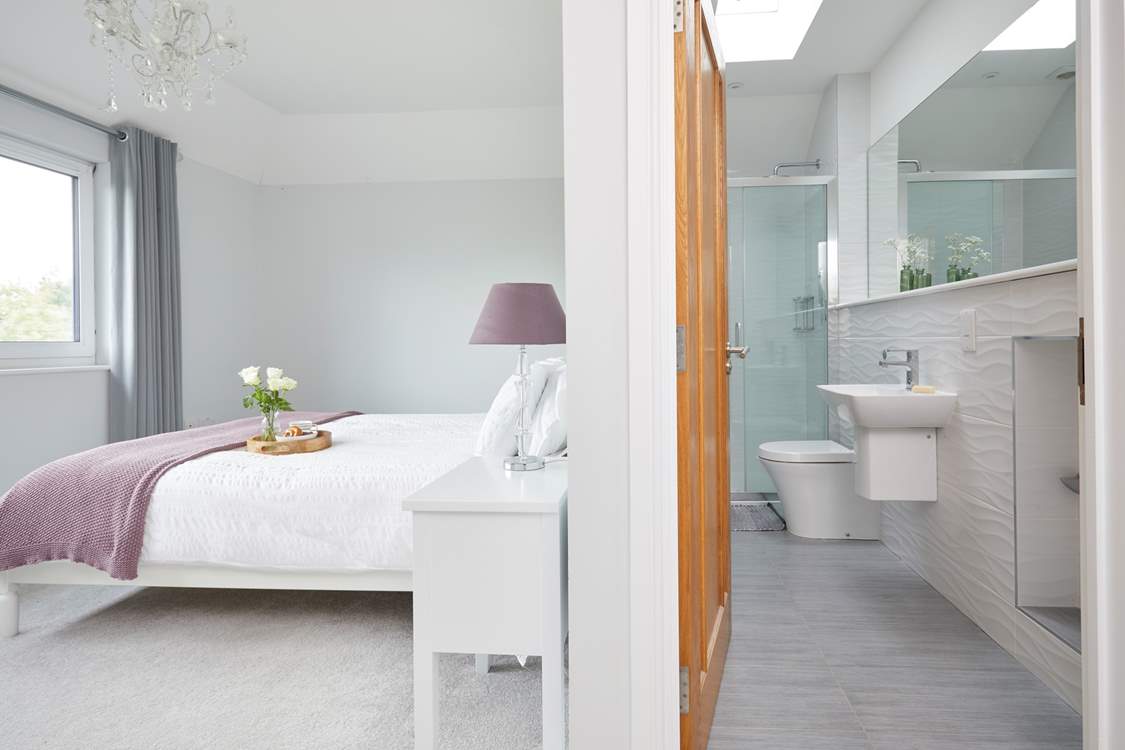 Bedroom one is beautifully decorated and has an en suite shower-room.