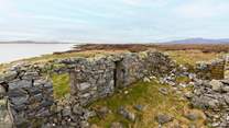 The old croft house still sits on the sea shore.