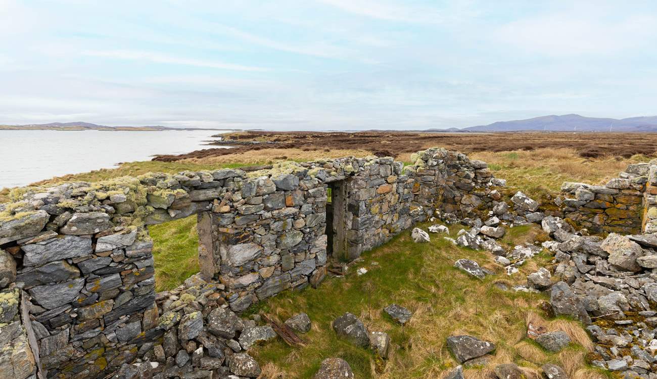 The old croft house still sits on the sea shore.