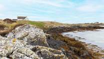 The shoreline is only metres away from your front door.