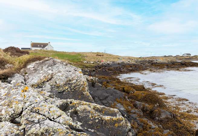The shoreline is only metres away from your front door.