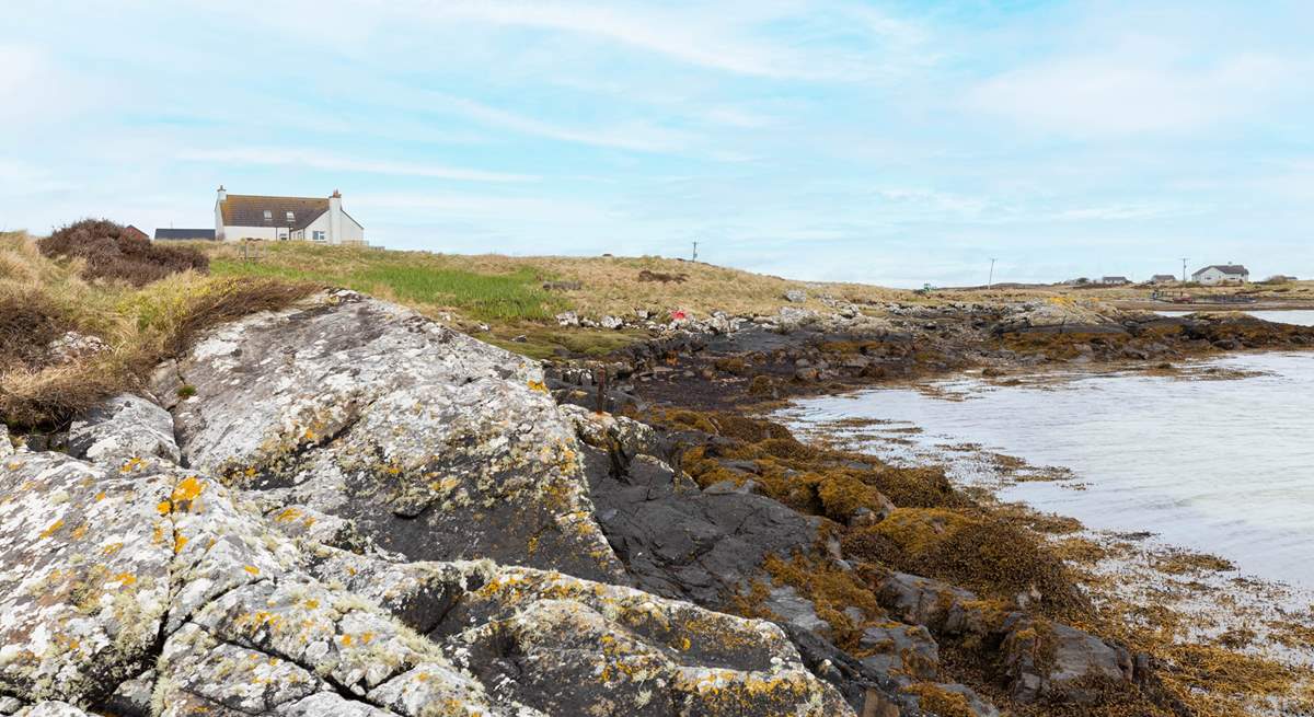 The shoreline is only metres away from your front door.