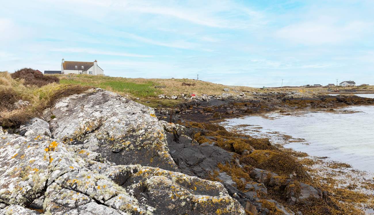 The shoreline is only metres away from your front door.