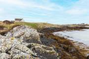 The shoreline is only metres away from your front door.