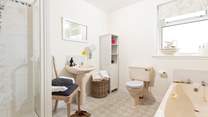 Spacious ground floor bathroom - there's a bath and a separate shower cubicle.