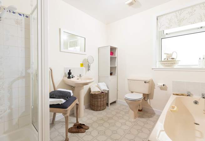 Spacious ground floor bathroom - there's a bath and a separate shower cubicle.