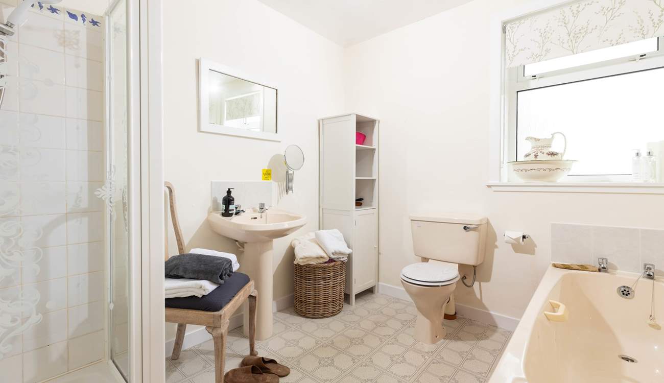 Spacious ground floor bathroom - there's a bath and a separate shower cubicle.
