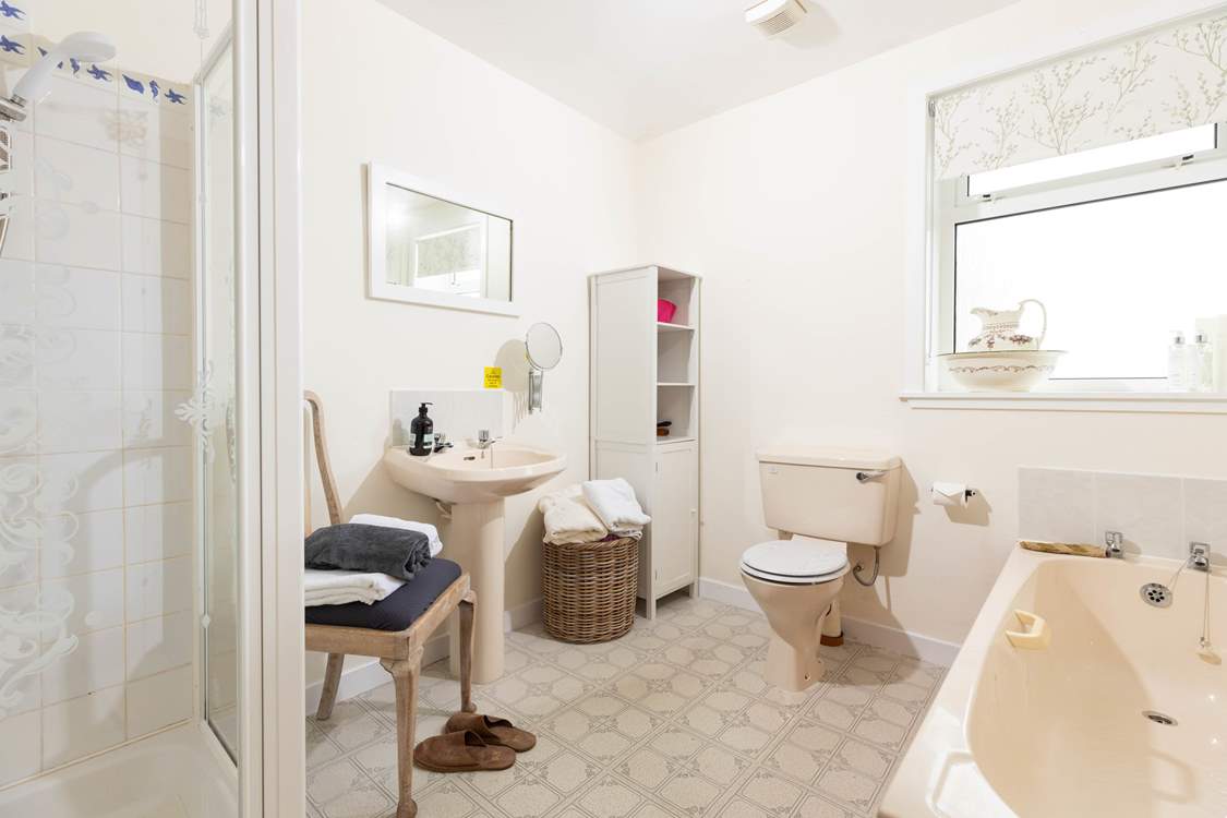 Spacious ground floor bathroom - there's a bath and a separate shower cubicle.