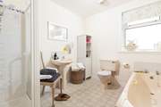 Spacious ground floor bathroom - there's a bath and a separate shower cubicle.