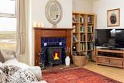 Cosy up by the peat fire.