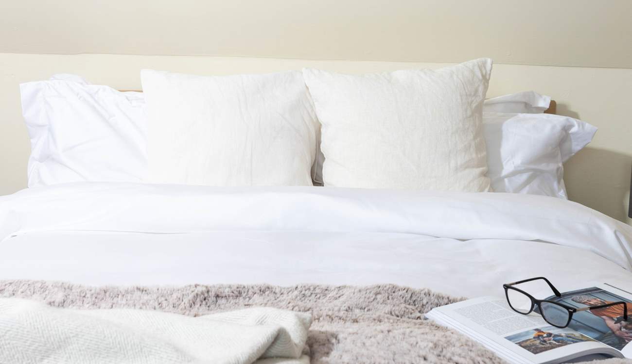 Snuggle into the fluffy pillows. 