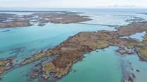 The seas around Benbecula are crystal clear, azure blue and sparkling. 