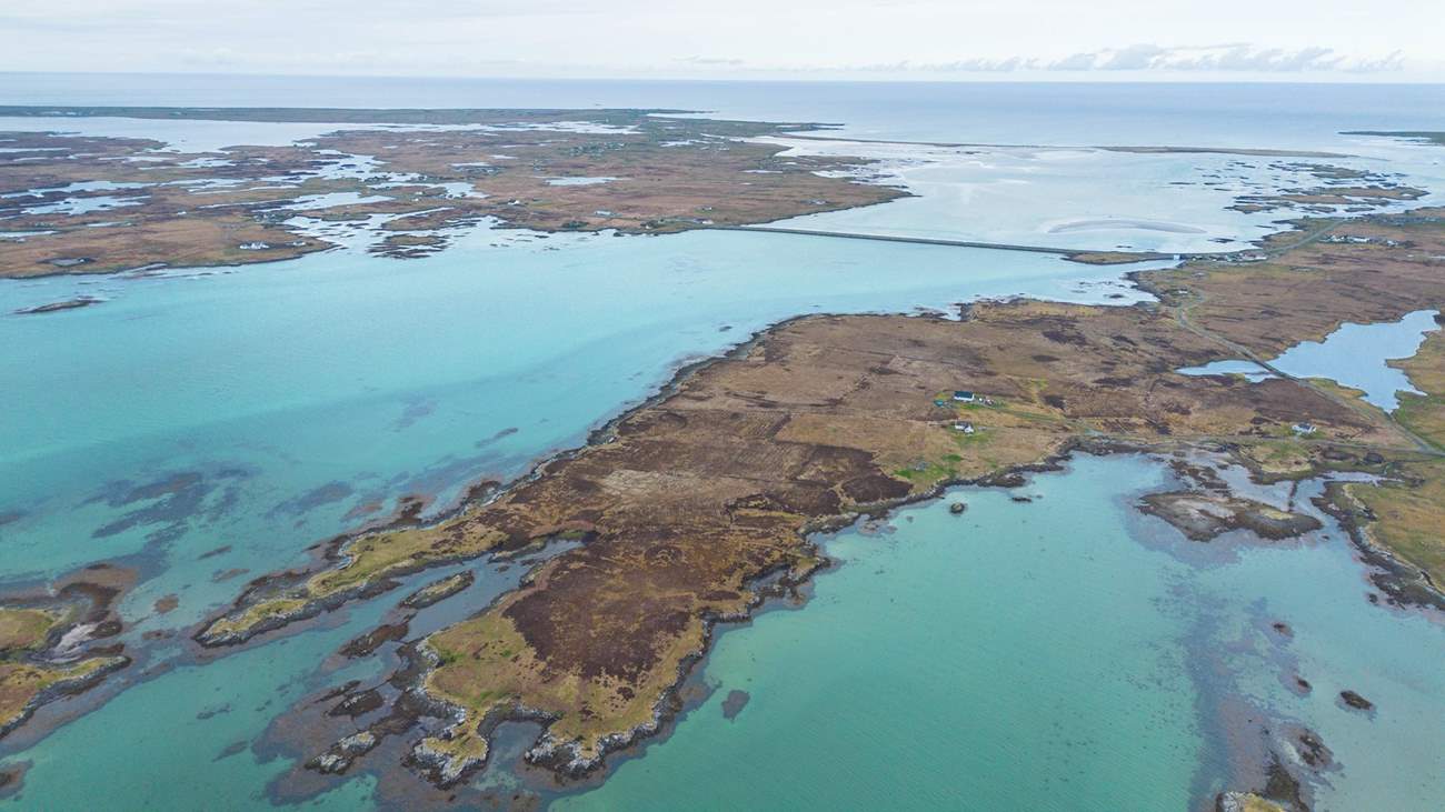 The seas around Benbecula are crystal clear, azure blue and sparkling.