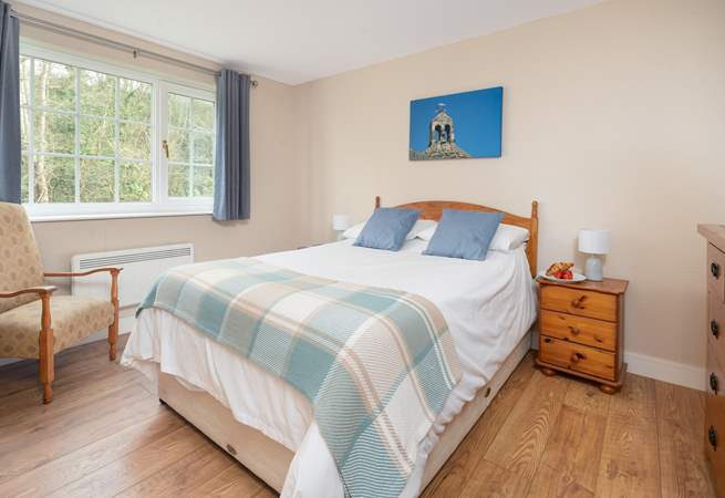 The double room has a woodland view. 