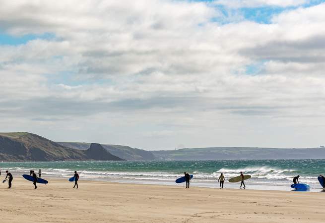Newgale, with swathes of golden sands and rolling surf. 