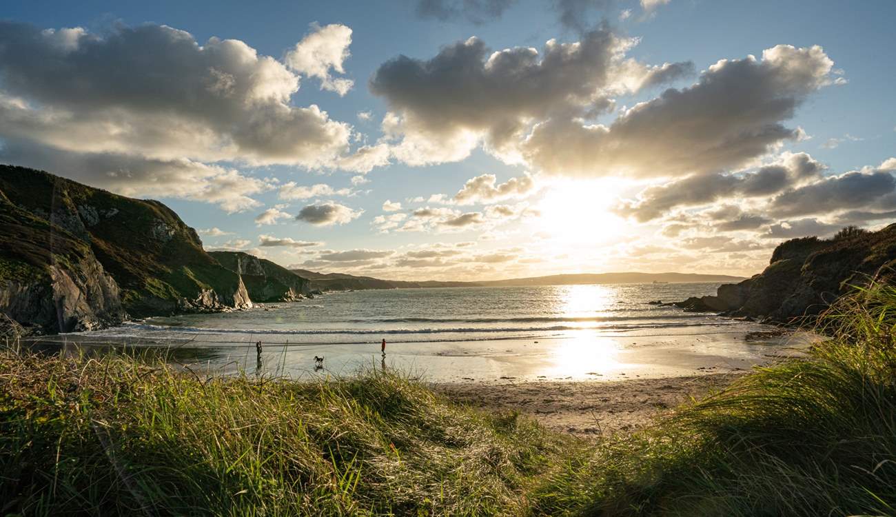 The sun going down over enchanting Pwllgwaelod Beach. 