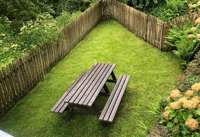 The pretty enchanting garden is surrounded by woodland. Listen for the babbling brook. Idyllic. No wonder guests love it here. 