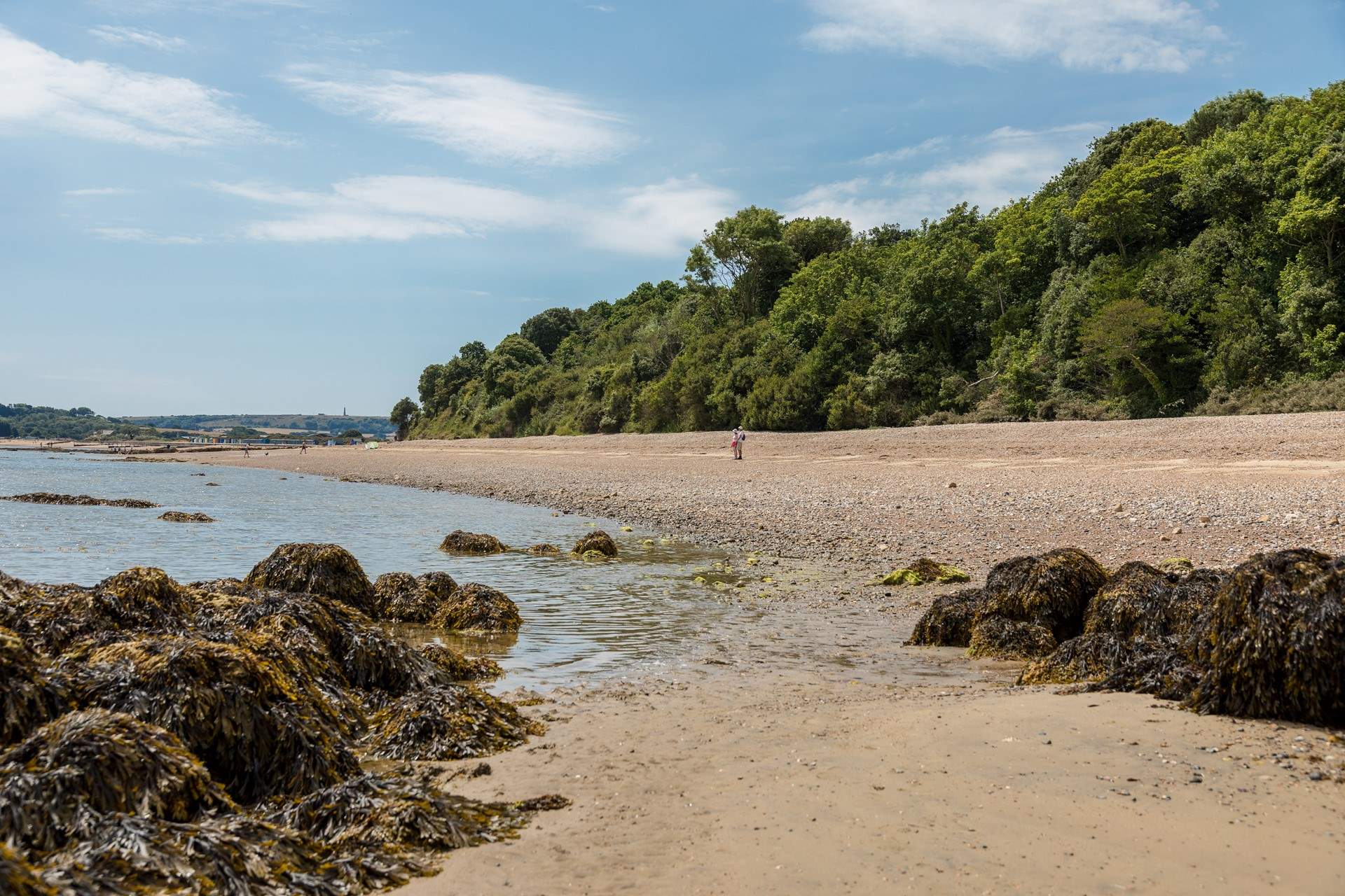 Take a walk along the beach at Priory Bay.