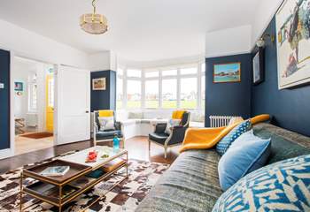 Views over the green can be found from the comfy sitting-room.