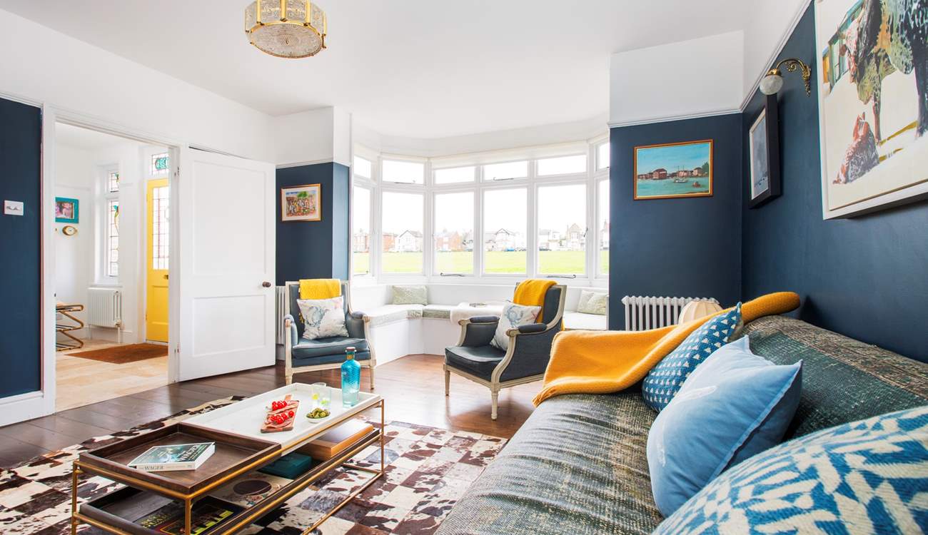 Views over the green can be found from the comfy sitting-room.