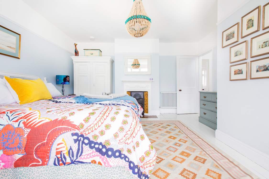 A bright and comfy bedroom.