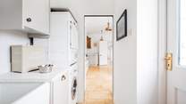 The handy utility-room is just off the kitchen.