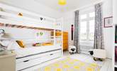 The kids will love this cheerful room. - Thumbnail Image