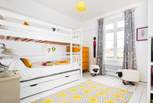 The kids will love this cheerful room.