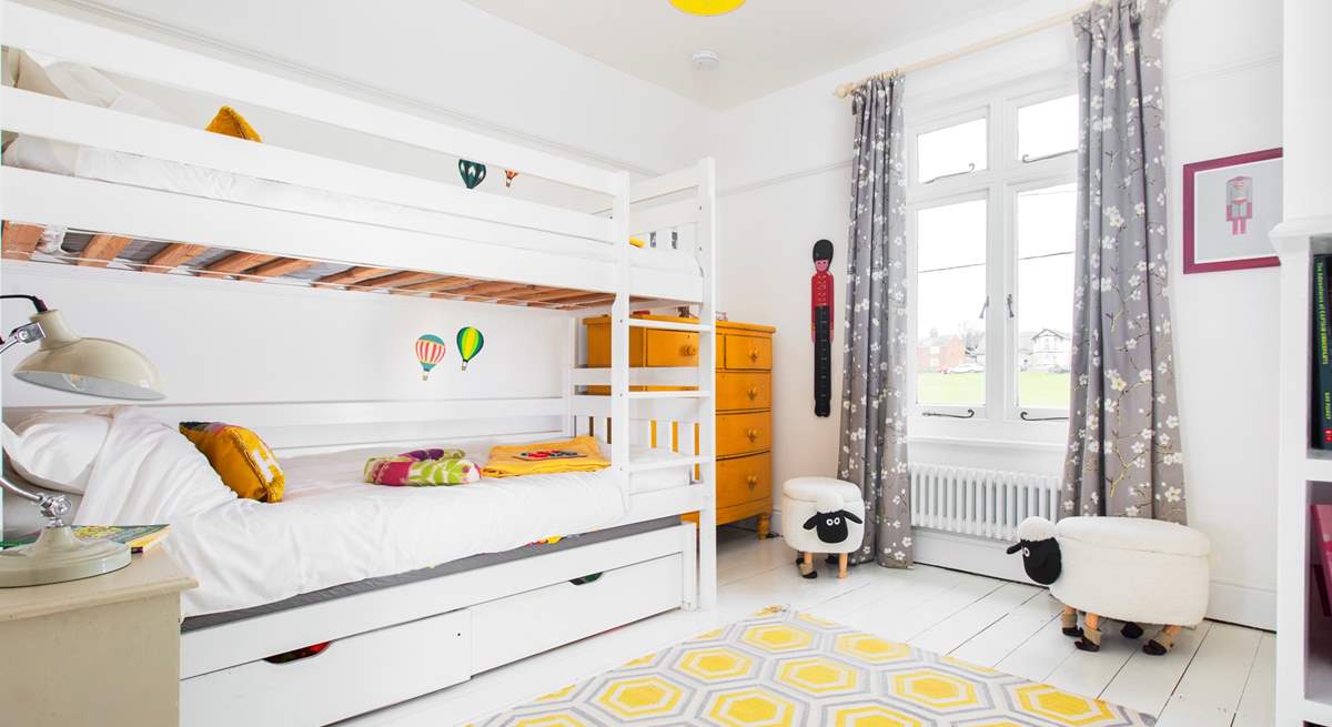 The kids will love this cheerful room.