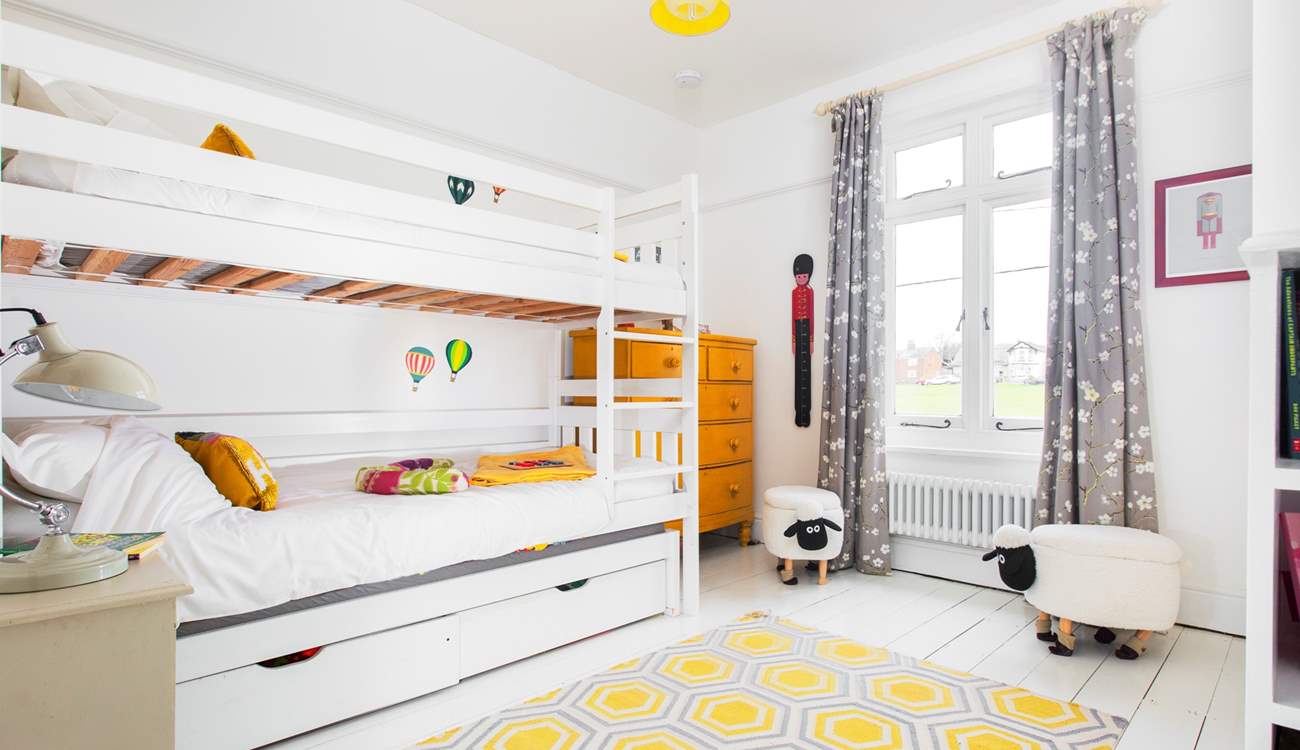 The kids will love this cheerful room.