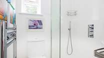 The downstairs shower-room leads off the utility-room, perfect for rinsing salty toes.