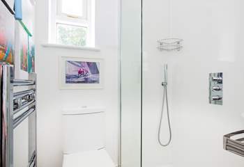 The downstairs shower-room leads off the utility-room, perfect for rinsing salty toes.