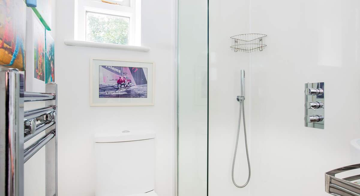 The downstairs shower-room leads off the utility-room, perfect for rinsing salty toes.