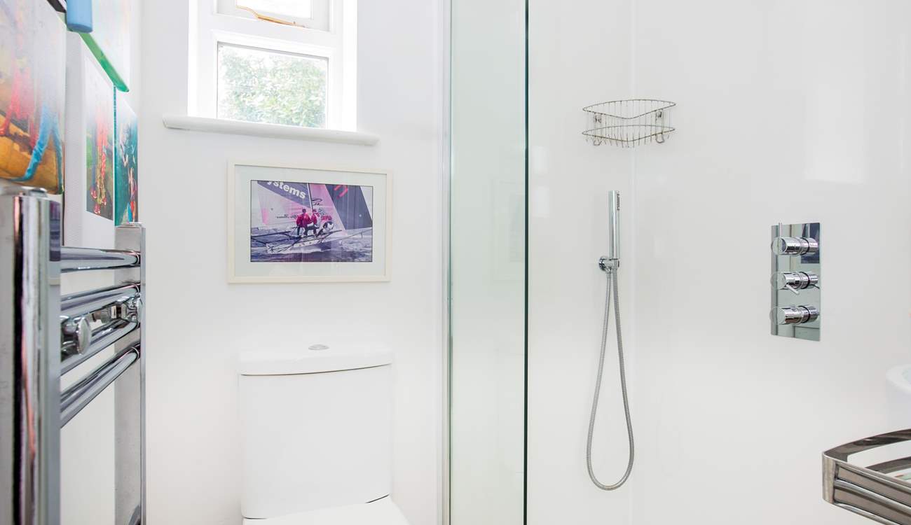 The downstairs shower-room leads off the utility-room, perfect for rinsing salty toes.