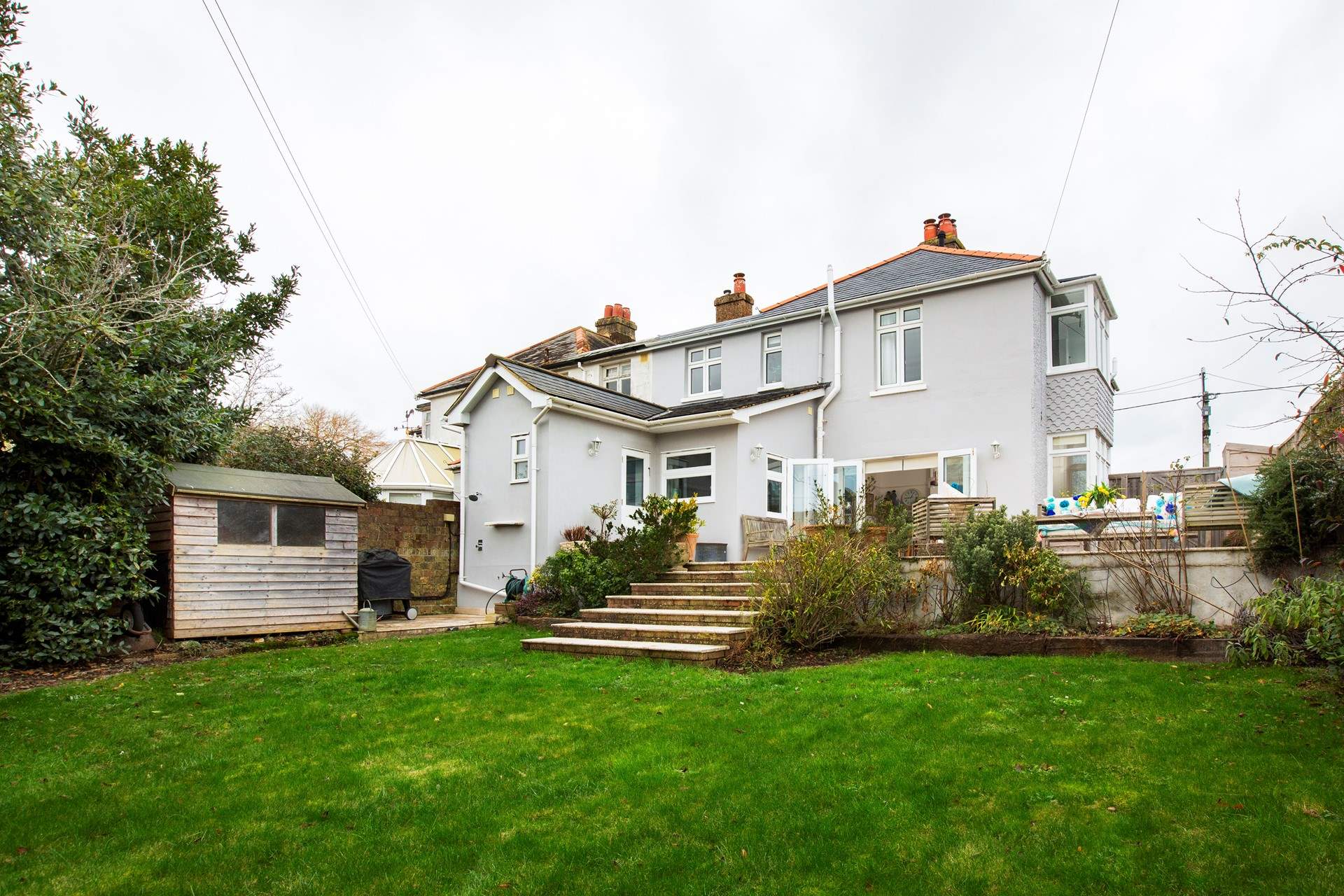 A great garden to enjoy - please be careful with children on the terrace as there is a drop to the lawned area.