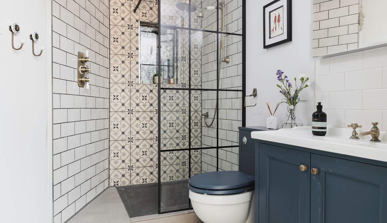 The pretty hidden shower-room on the ground floor.