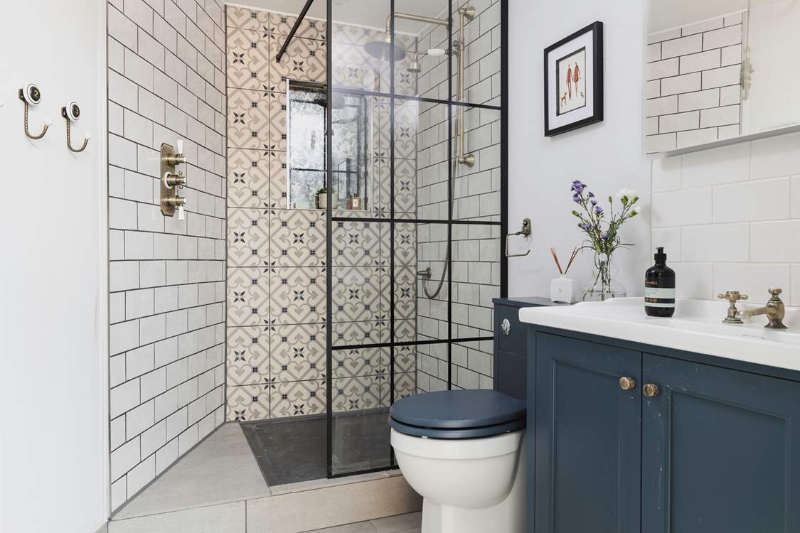 The pretty hidden shower-room on the ground floor.