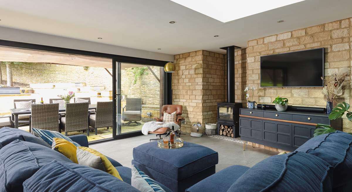 A lovely living area creates an inviting space to unwind in this open plan design. 