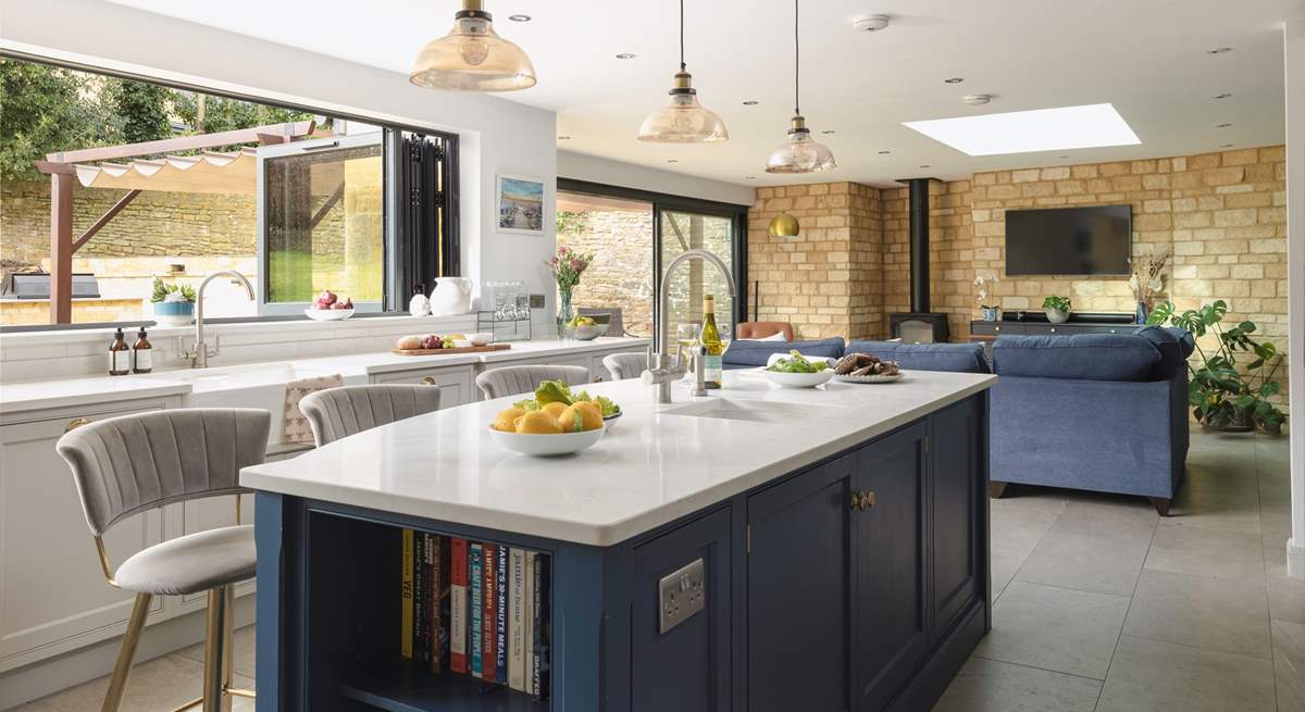 There is a wonderful sense of space and light in the impressive kitchen/living area.