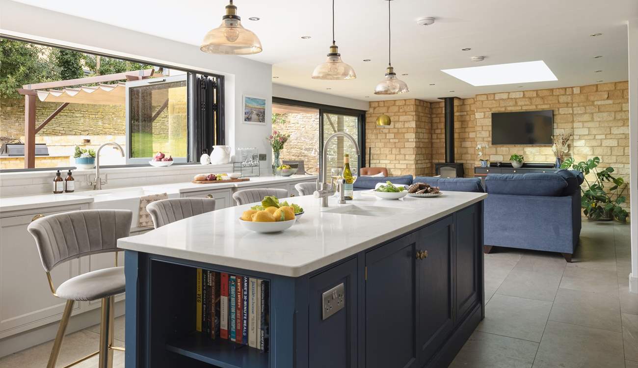 There is a wonderful sense of space and light in the impressive kitchen/living area.