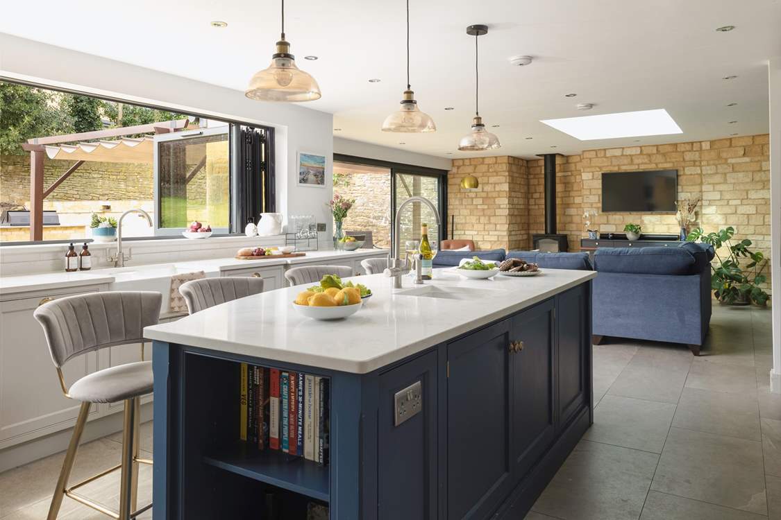 There is a wonderful sense of space and light in the impressive kitchen/living area.