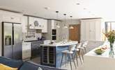 The beautiful kitchen is the centre-piece of the property. - Thumbnail Image