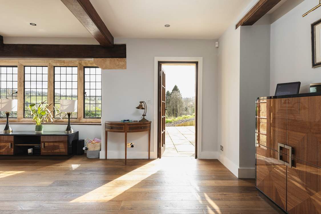 You can access a lovely outdoor sitting-area from the sitting-room.