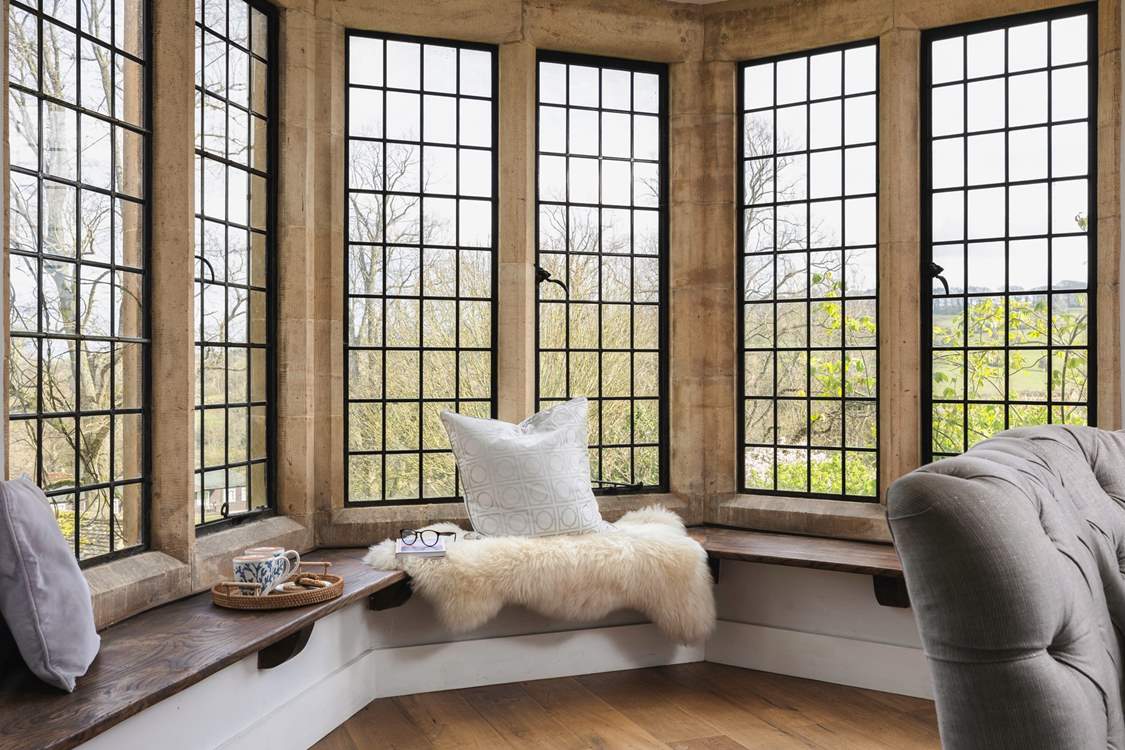The double-aspect windows provide dreamy views across the village and there is a lovely window seat which lends itself to lazy days unwinding.
